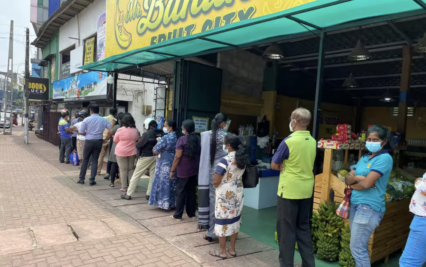 Queues for milk in Colombo, Sri Lanka, showing supply shortages that have been evident for months before the Ukraine crisis