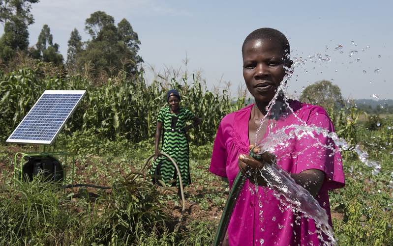 Farmers in Kenya with solar irrigation